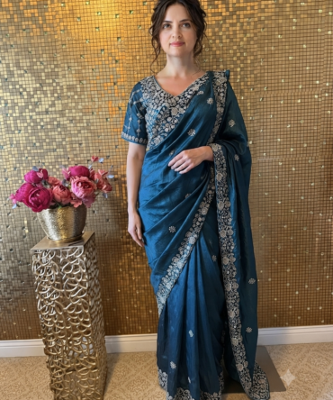 Beautiful dark peacock blue saree with hand embroidered