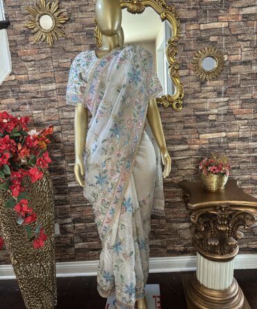 Very elegant ivory color saree