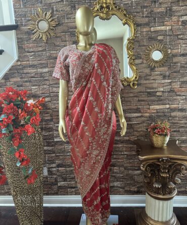 Beautiful tomato red saree with highly embroidery work