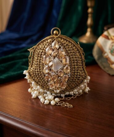 Beautiful brass with stone clutch